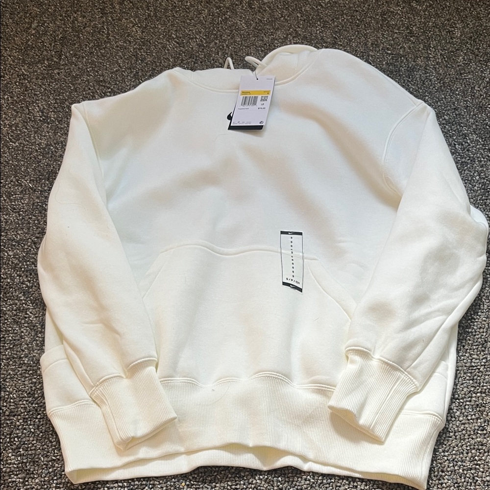 Women’s White Nike Hoodie
Size Small